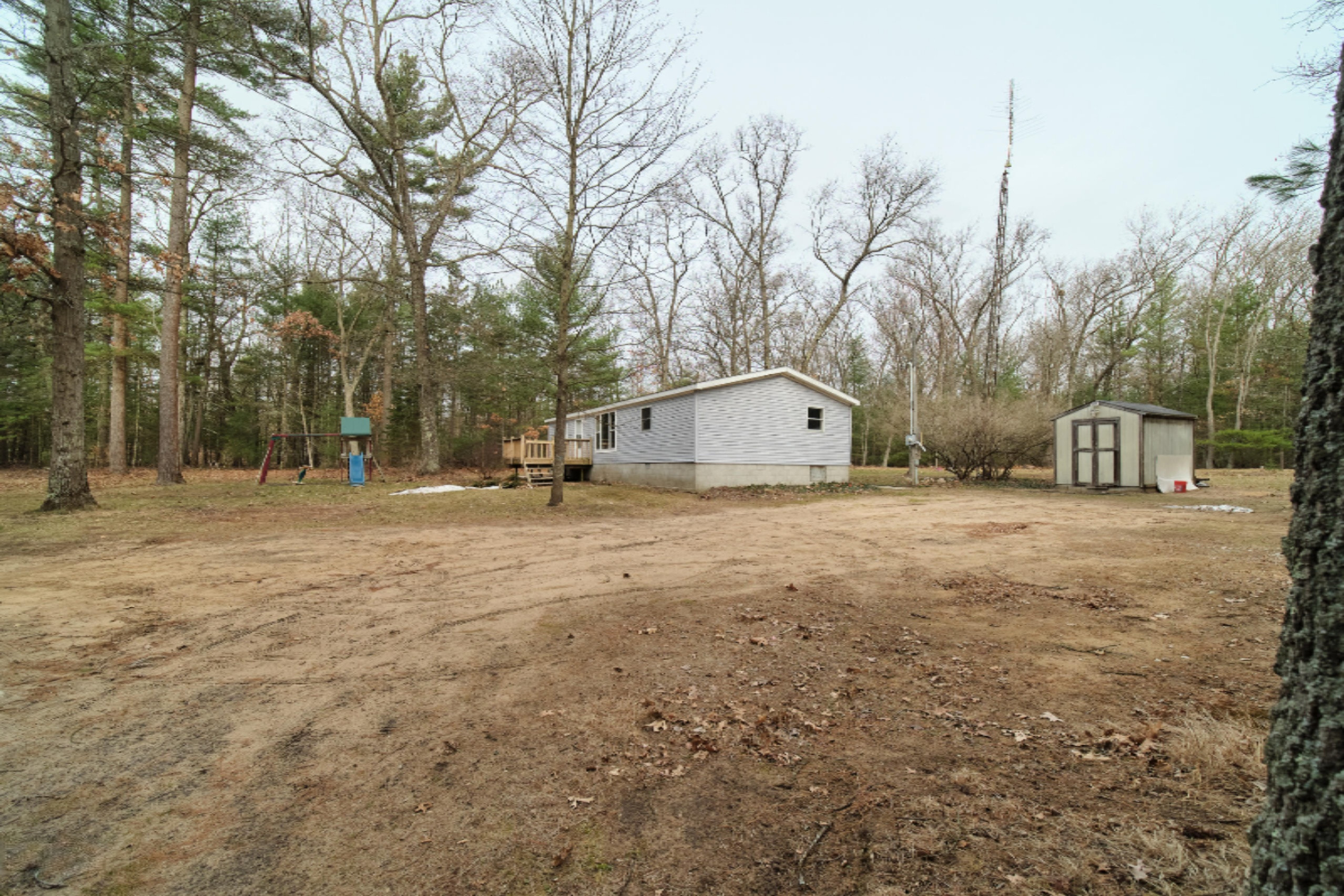 2230 Raymond Road Twin Lake, MI 49457 - Photo 10 of 47 Side of Home