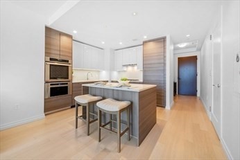 a kitchen with a sink cabinets and counter space