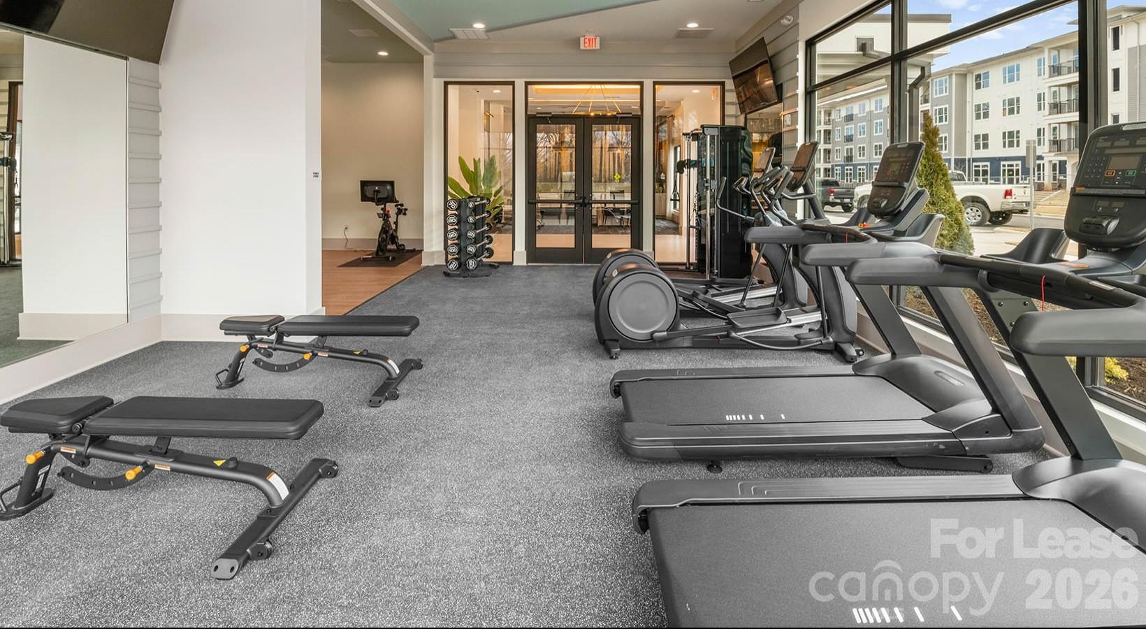 2546 Perimeter Pointe Parkway, Unit 1G Charlotte, NC 28208 - Photo 20 of 48 a view of a room with gym equipment