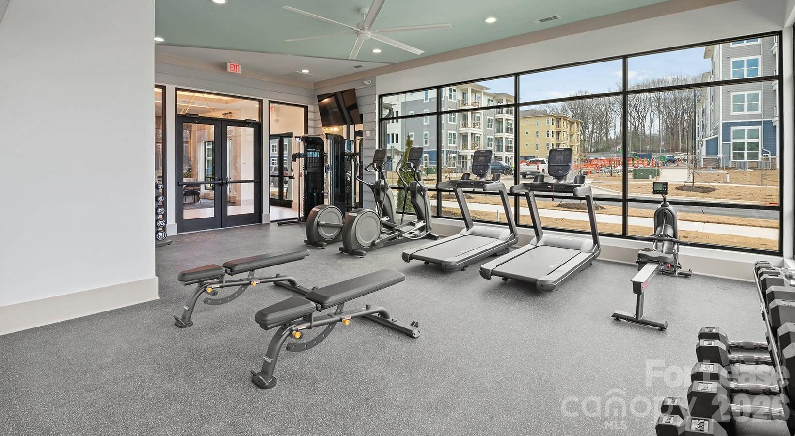 2546 Perimeter Pointe Parkway, Unit 1G Charlotte, NC 28208 - Photo 27 of 48 a view of a room with gym equipment
