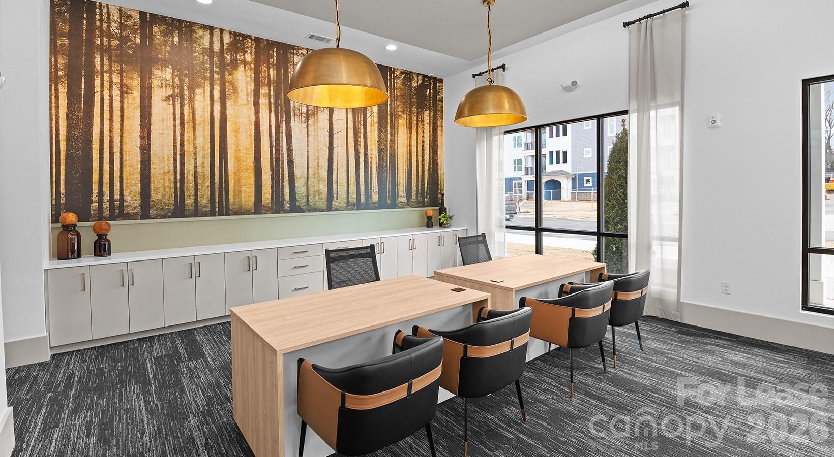 2546 Perimeter Pointe Parkway, Unit 1G Charlotte, NC 28208 - Photo 30 of 48 a view of a dining room with furniture window and wooden floor