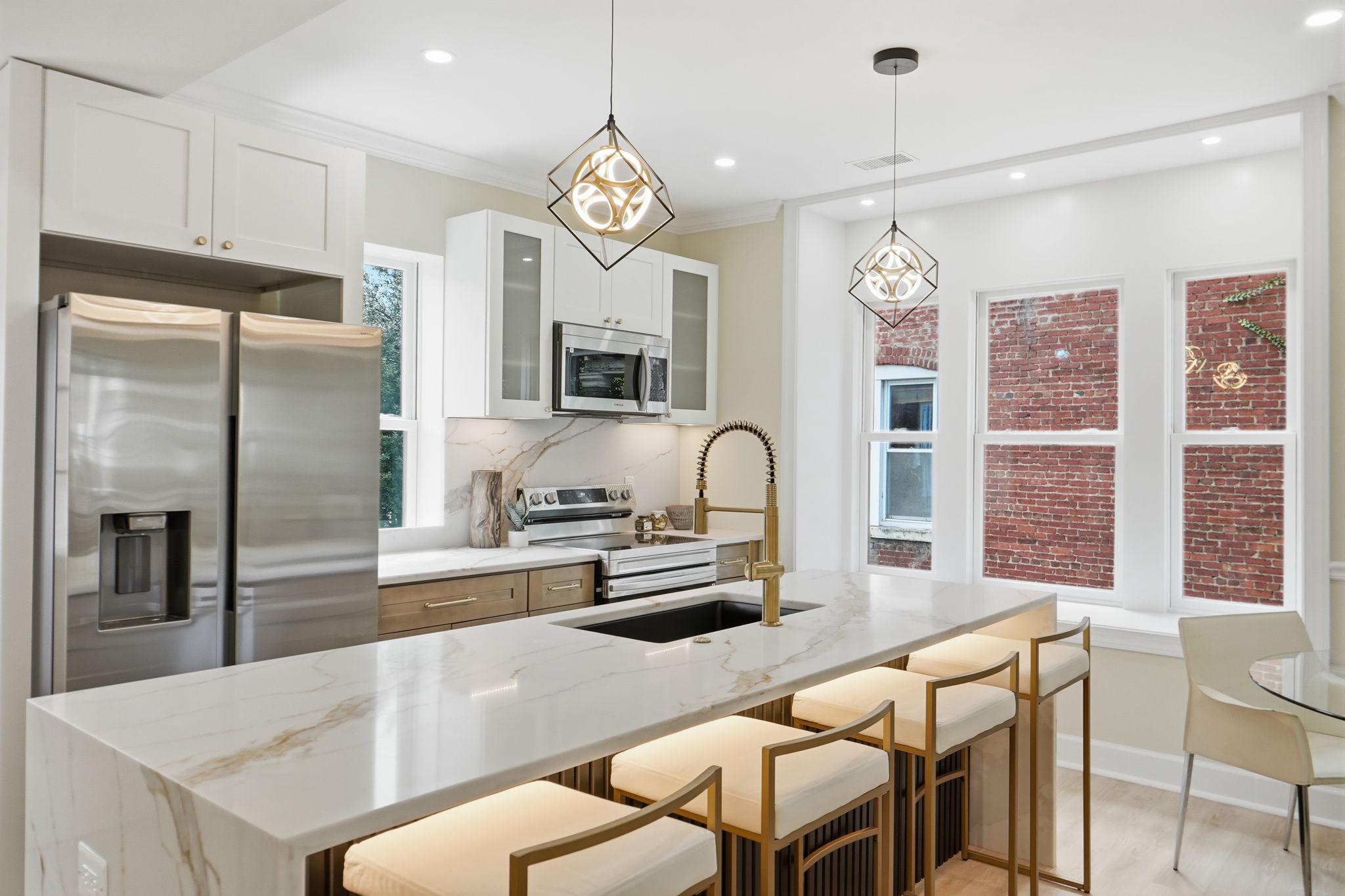 518 Columbia Road Northwest Washington, DC 20001 - Photo 9 of 35 Modern kitchen with elegant finishes.