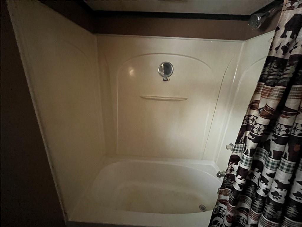 539 5th Street Colver, PA 15927 - Photo 9 of 13 a bathroom with a bathtub