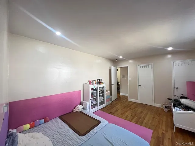 a bed room with a bed and a couch