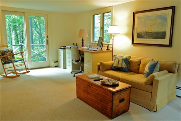 1 Woodland Road Andover, MA 01810 - Photo 8 of 26 a living room with furniture and a large window