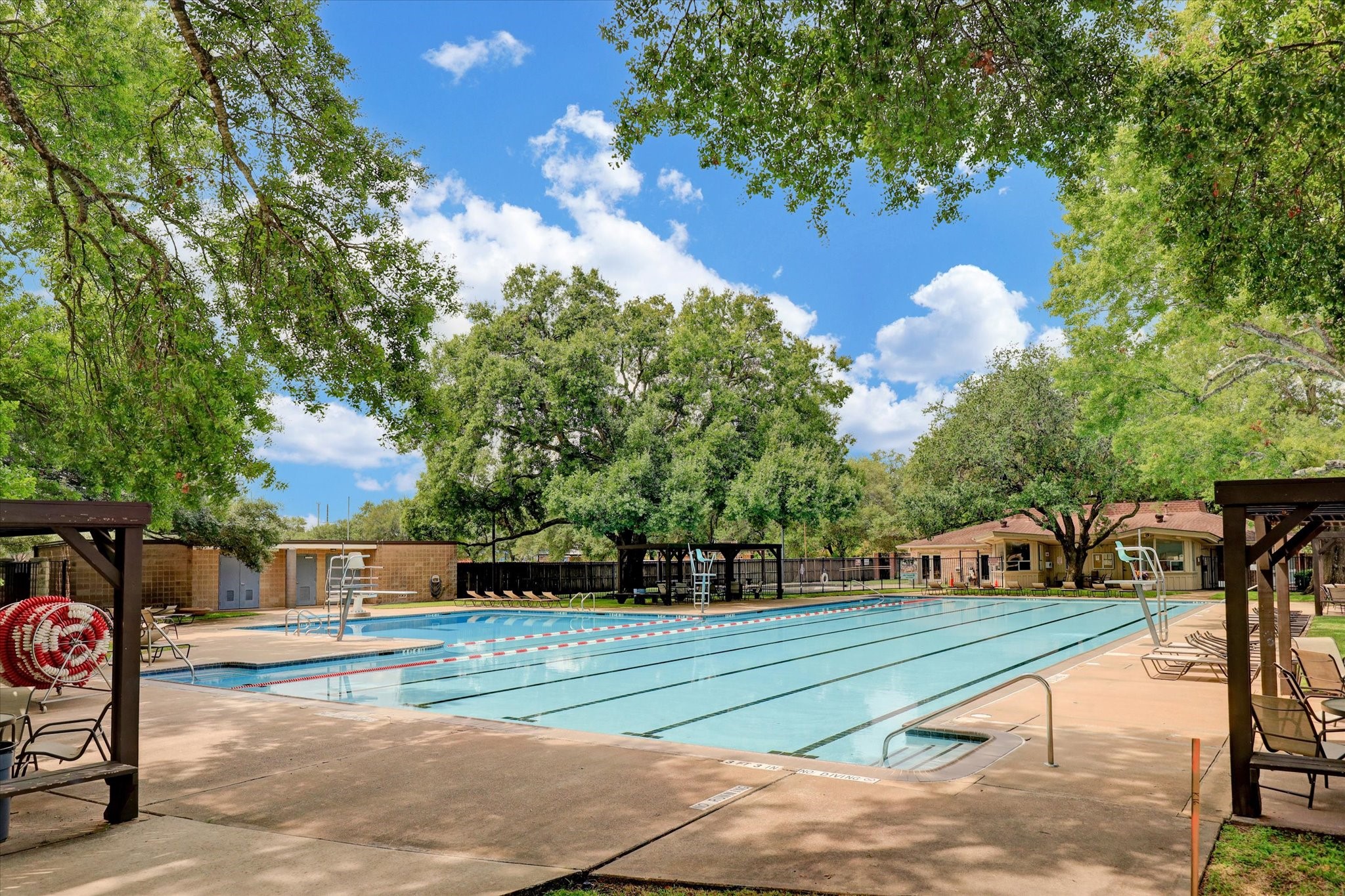 10203 Green Tree Road Houston, TX 77042 - Photo 25 of 28 The neighborhood pool is a short walk from your front door.