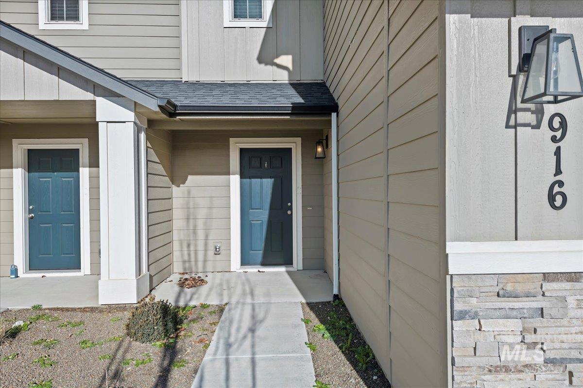 916 West Woodpine Street Meridian, ID 83646 - Photo 4 of 32 Property entrance with roof with shingles