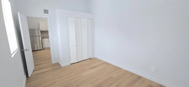 a view of small space with wooden floor