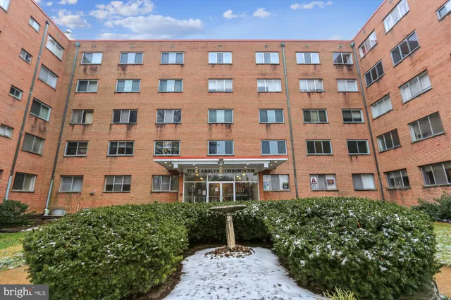 a car parked in front of a building