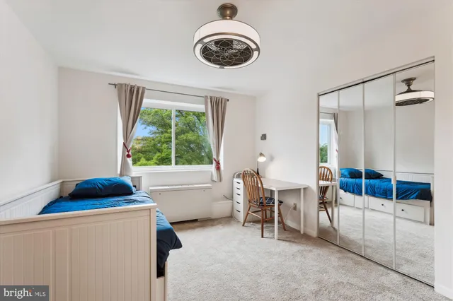 a view of a balcony with lake view and wooden floor