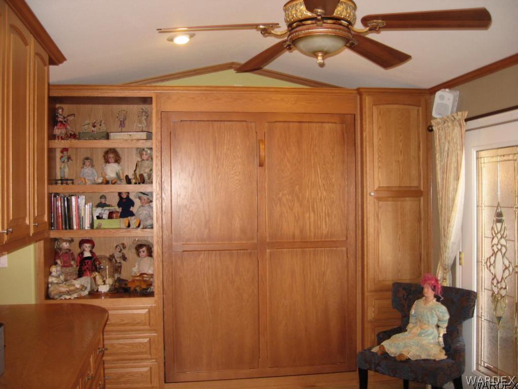 1905 Victoria Farms Road, Unit 83 Lake Havasu City, AZ 86404 - Photo 13 of 30 a bedroom with a bed and a window