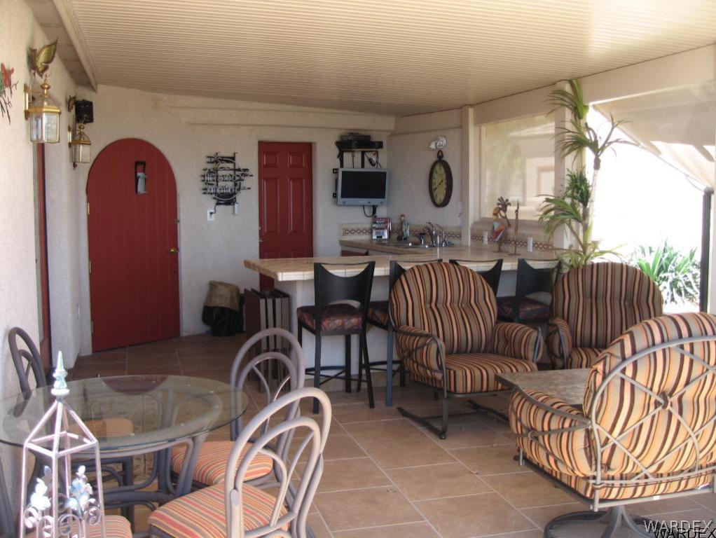 1905 Victoria Farms Road, Unit 83 Lake Havasu City, AZ 86404 - Photo 25 of 30 a view of a livingroom with furniture and bedroom