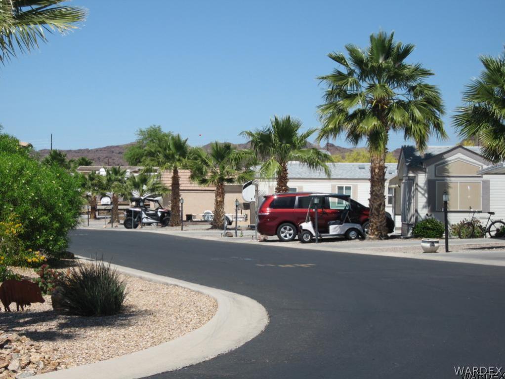 1905 Victoria Farms Road, Unit 83 Lake Havasu City, AZ 86404 - Photo 30 of 30 a view of street with parked cars
