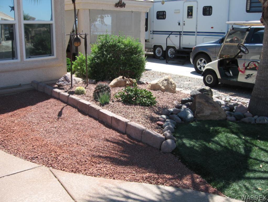 1905 Victoria Farms Road, Unit 83 Lake Havasu City, AZ 86404 - Photo 3 of 30 a car parked in front of a building