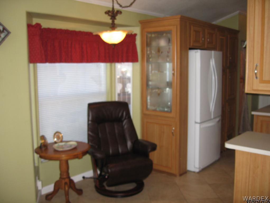 1905 Victoria Farms Road, Unit 83 Lake Havasu City, AZ 86404 - Photo 8 of 30 a view of a hallway with workspace and a window