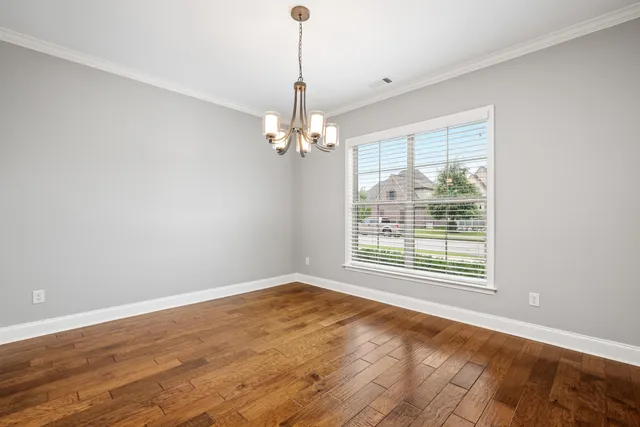 a room with furniture and a window