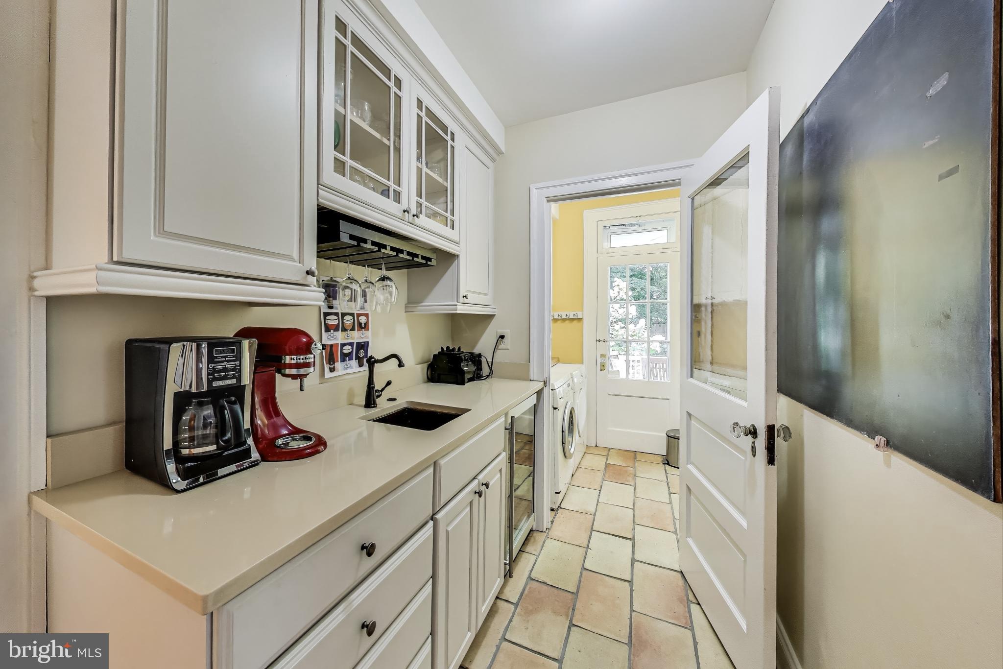 5809 Grosvenor Lane Bethesda, MD 20814 - Photo 13 of 41 Main level butler's pantry with beverage fridge