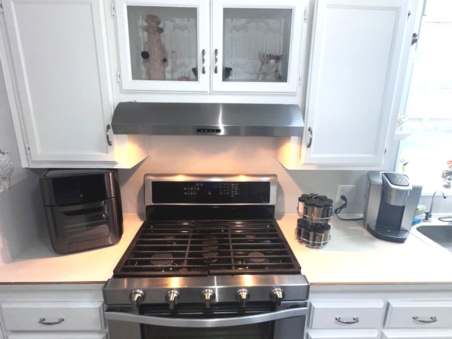 201 Greenview Road Belvidere, IL 61008 - Photo 12 of 57 a stove top oven sitting inside of a kitchen