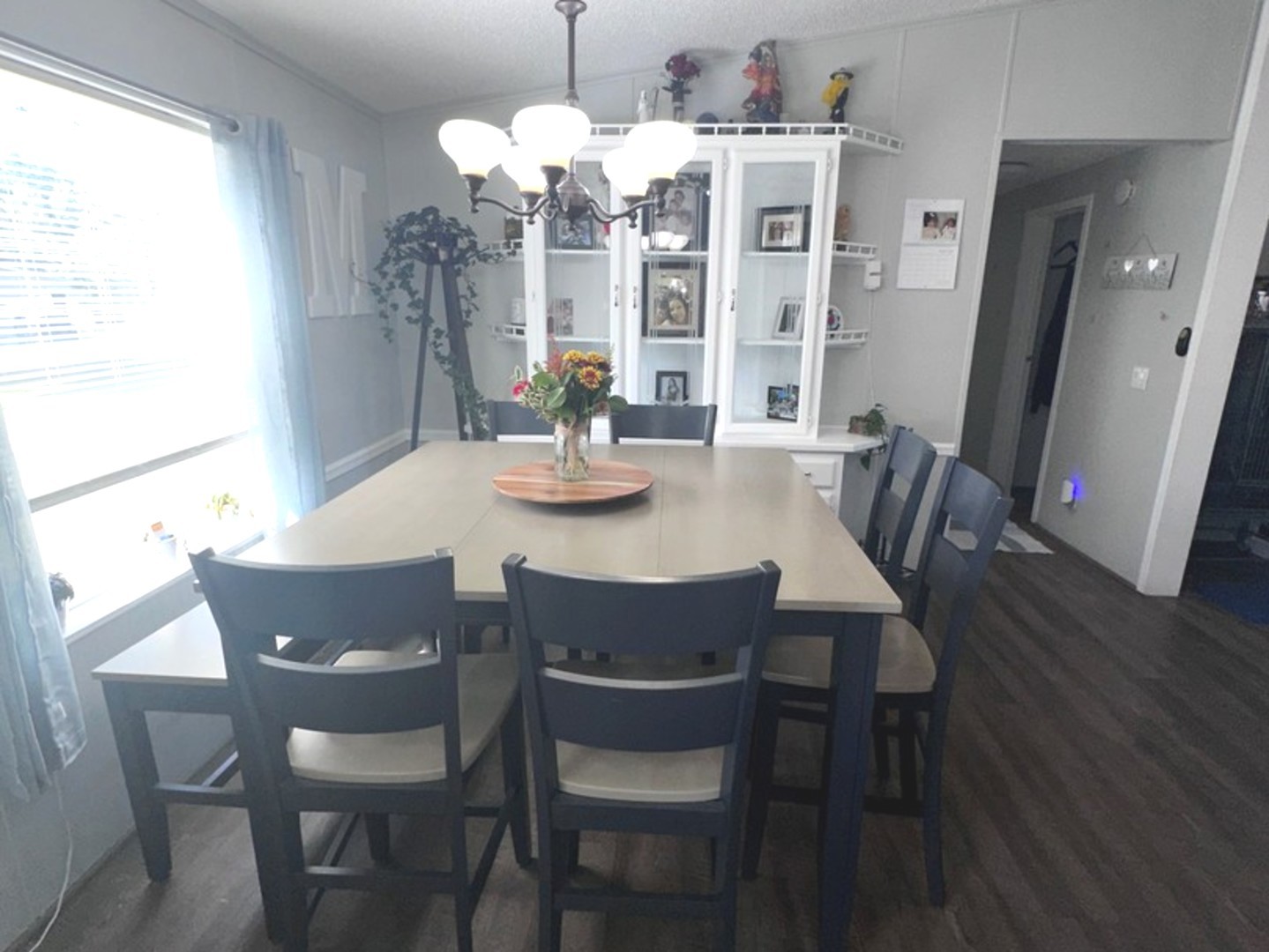 201 Greenview Road Belvidere, IL 61008 - Photo 17 of 57 a view of a dining room with furniture wooden floor and chandelier
