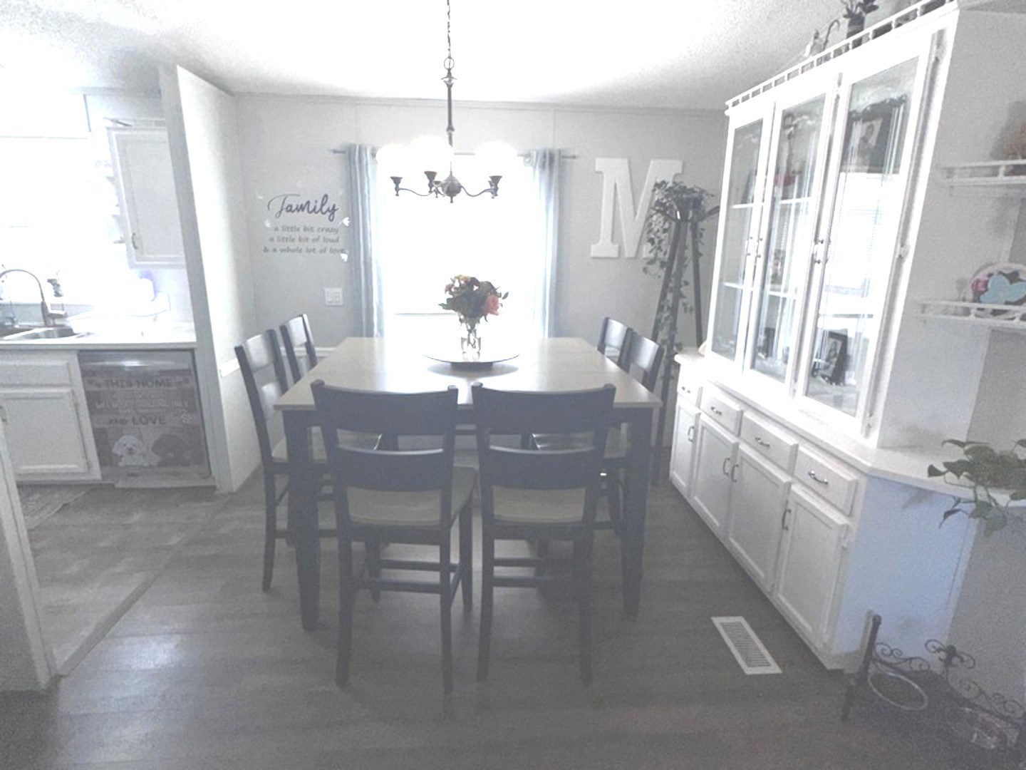 201 Greenview Road Belvidere, IL 61008 - Photo 18 of 57 a view of a dining room with furniture window and wooden floor