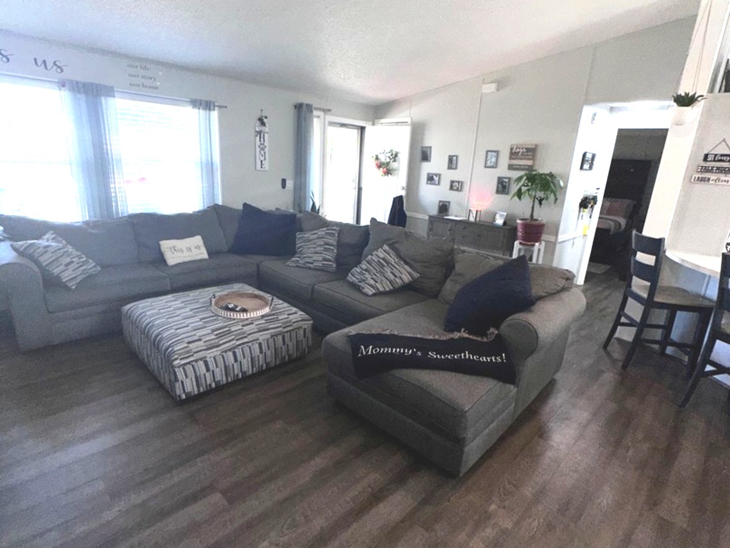 201 Greenview Road Belvidere, IL 61008 - Photo 30 of 57 a living room with furniture or couch and a wooden floor