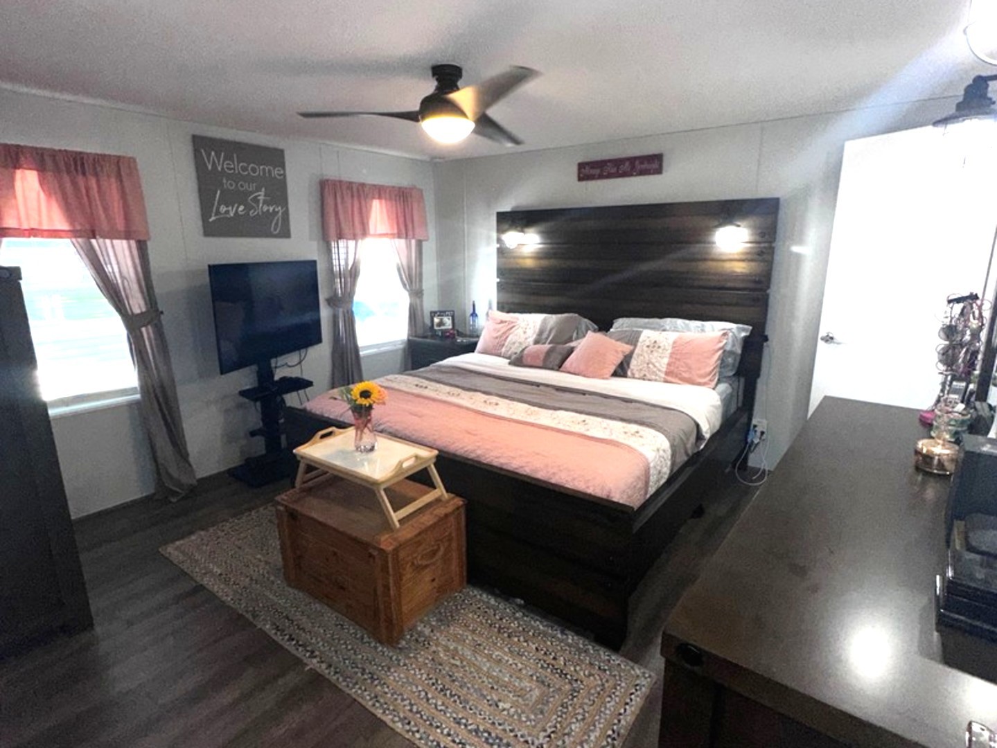 201 Greenview Road Belvidere, IL 61008 - Photo 32 of 57 a bedroom with a bed and wooden floor