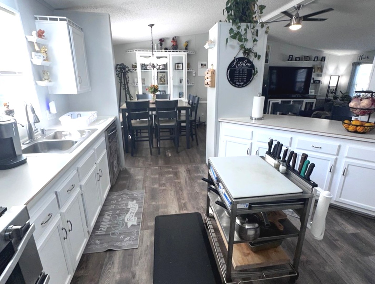 201 Greenview Road Belvidere, IL 61008 - Photo 7 of 57 a large kitchen with kitchen island a table and chairs in it