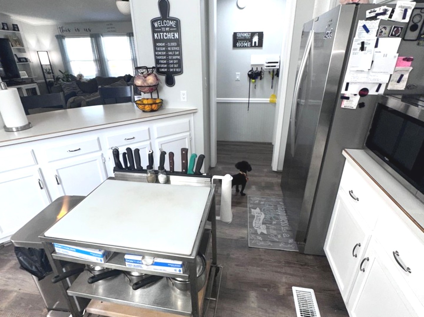 201 Greenview Road Belvidere, IL 61008 - Photo 9 of 57 a view of a kitchen with fridge and wooden floor
