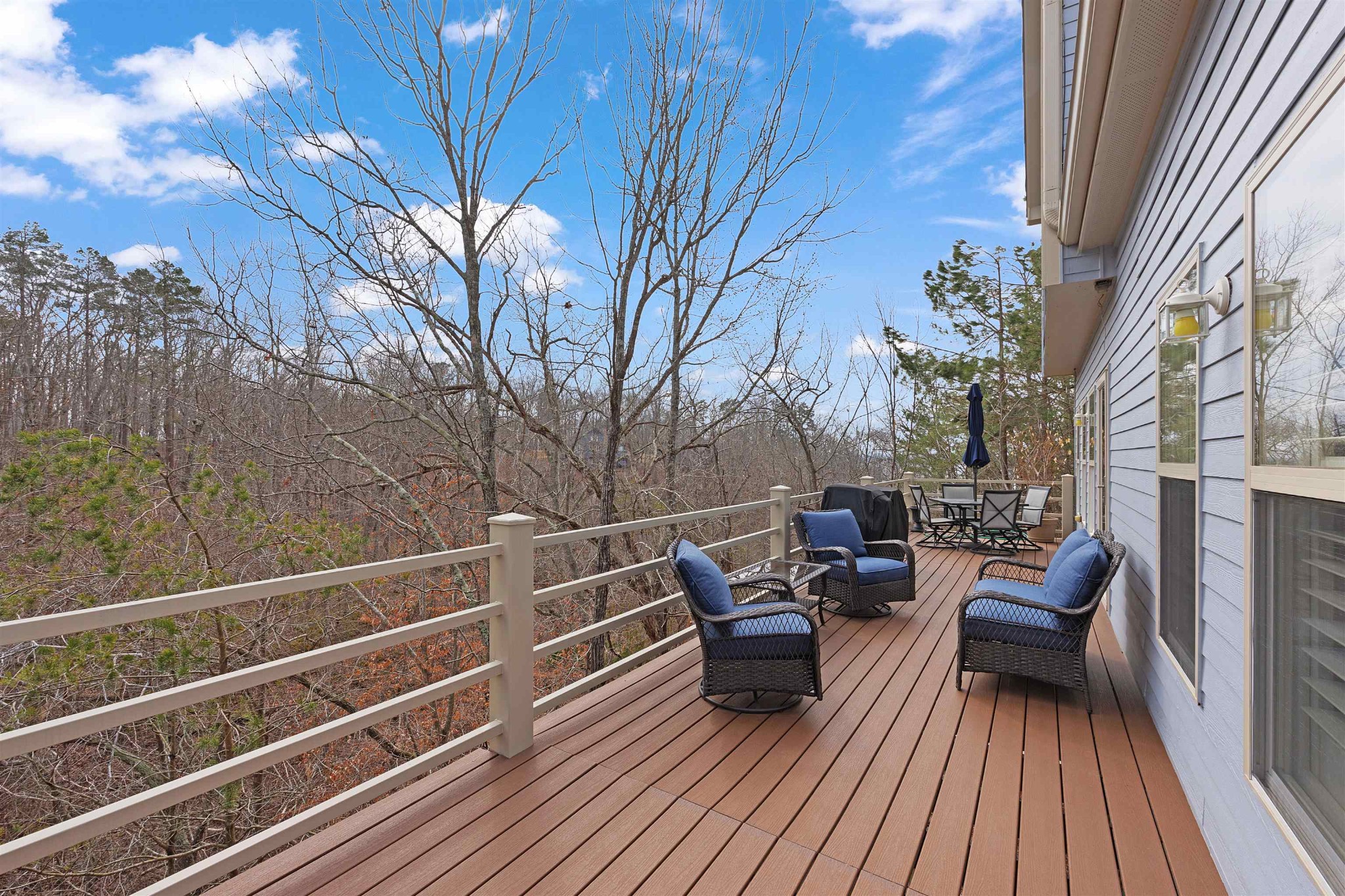 145 Deer Path Savannah, TN 38372 - Photo 19 of 23 a view of a roof deck with couches and potted plants
