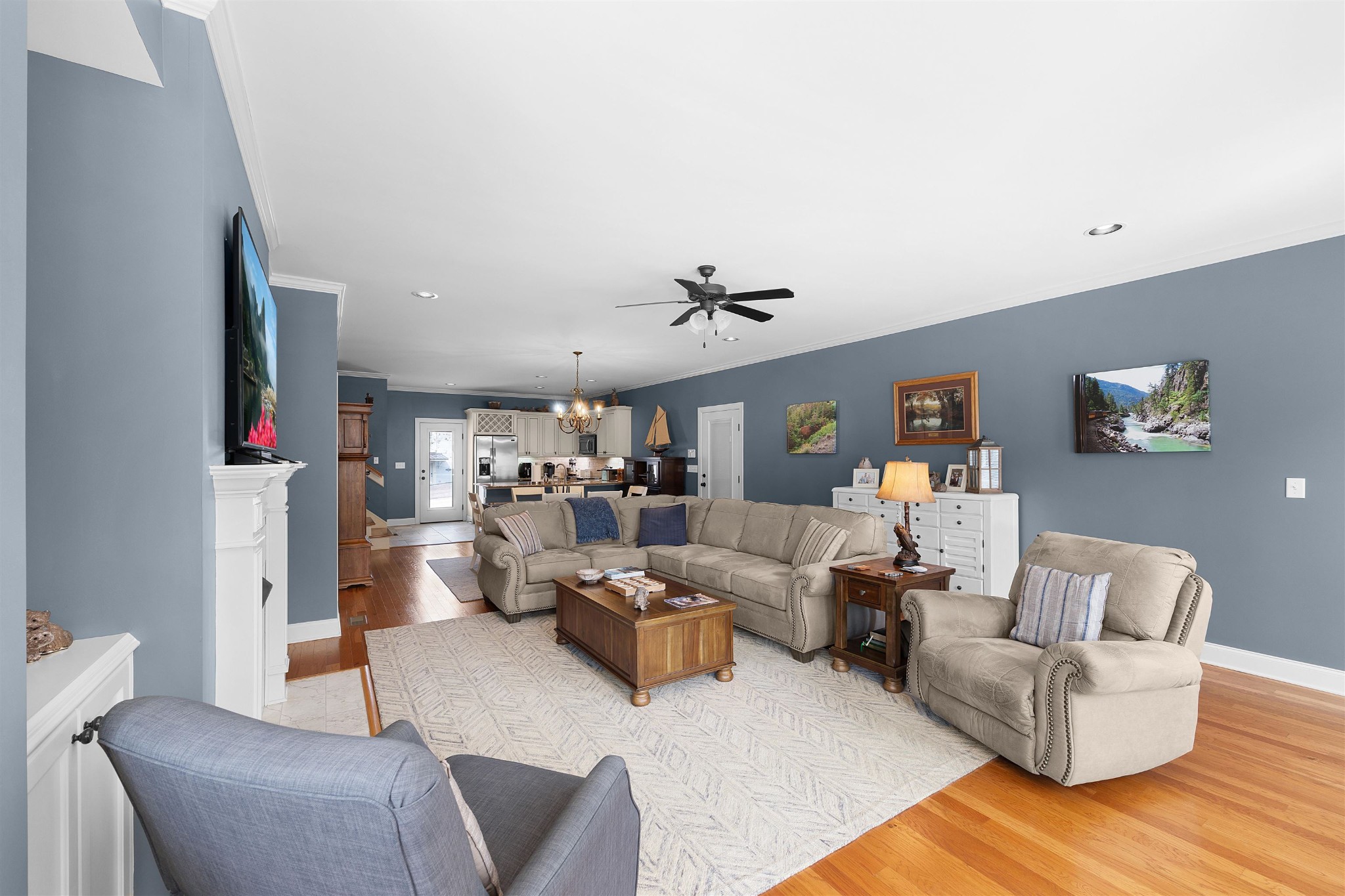 145 Deer Path Savannah, TN 38372 - Photo 6 of 23 a living room with furniture and a chandelier