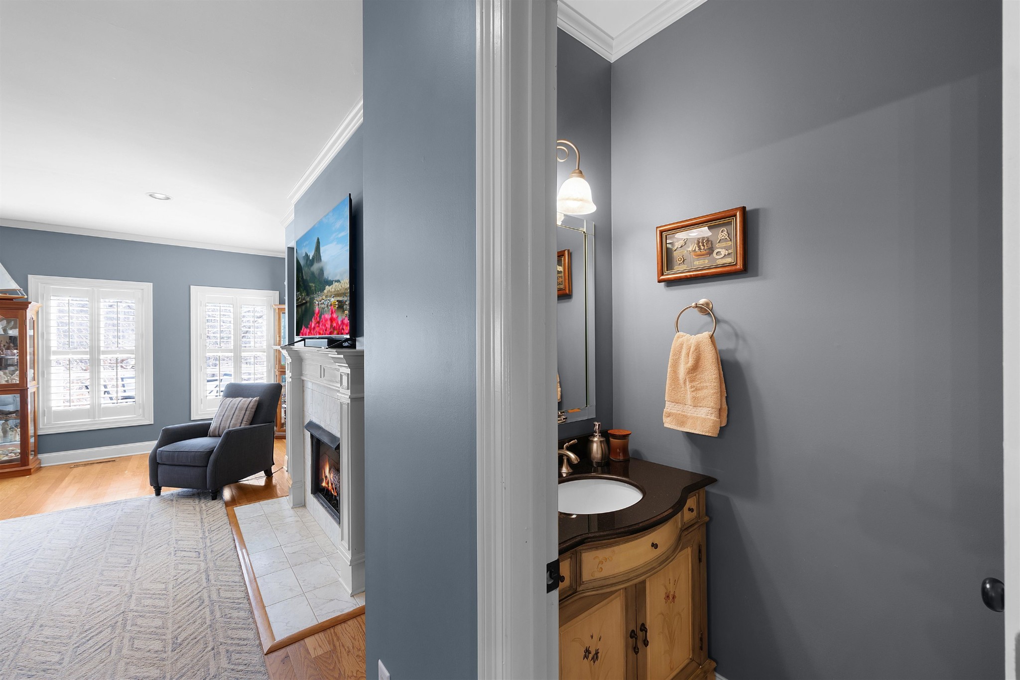 145 Deer Path Savannah, TN 38372 - Photo 7 of 23 a bathroom with a sink and a mirror