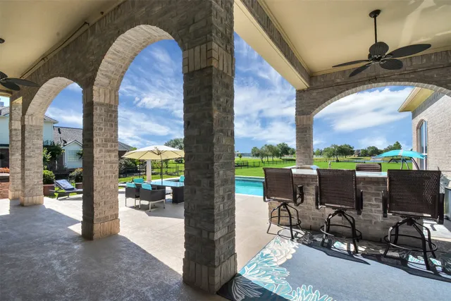 a view of balcony with furniture