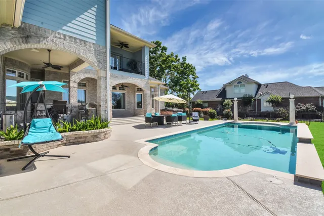 a view of a house with a swimming pool