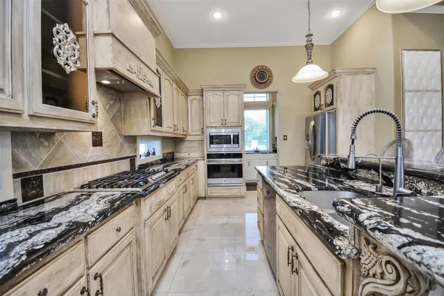 a view of a living room with furniture and a flat screen tv