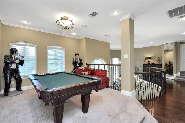 a room with furniture and a flat screen tv