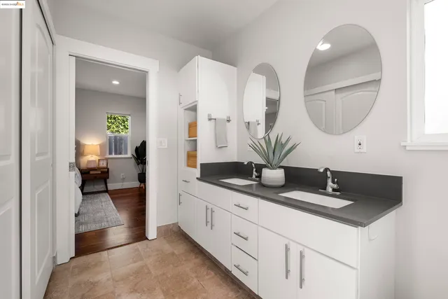 a bathroom with a toilet sink and shower