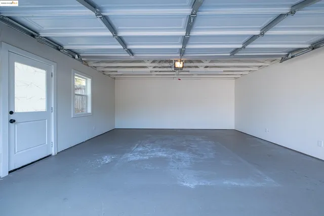 a view of backyard with a garden and plants