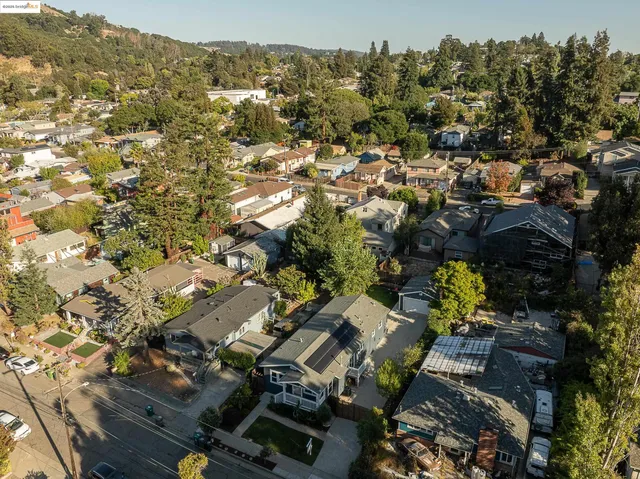 an aerial view of a house with a garden