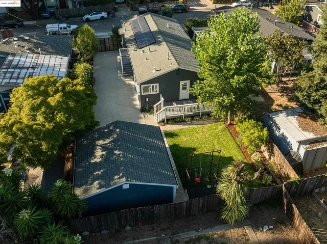 an aerial view of a house with garden