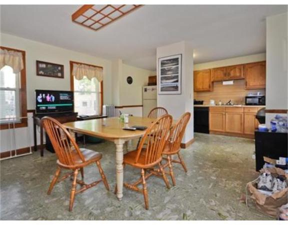270 Spring Street Boston, MA 02132 - Photo 7 of 18 a dining room with furniture and window