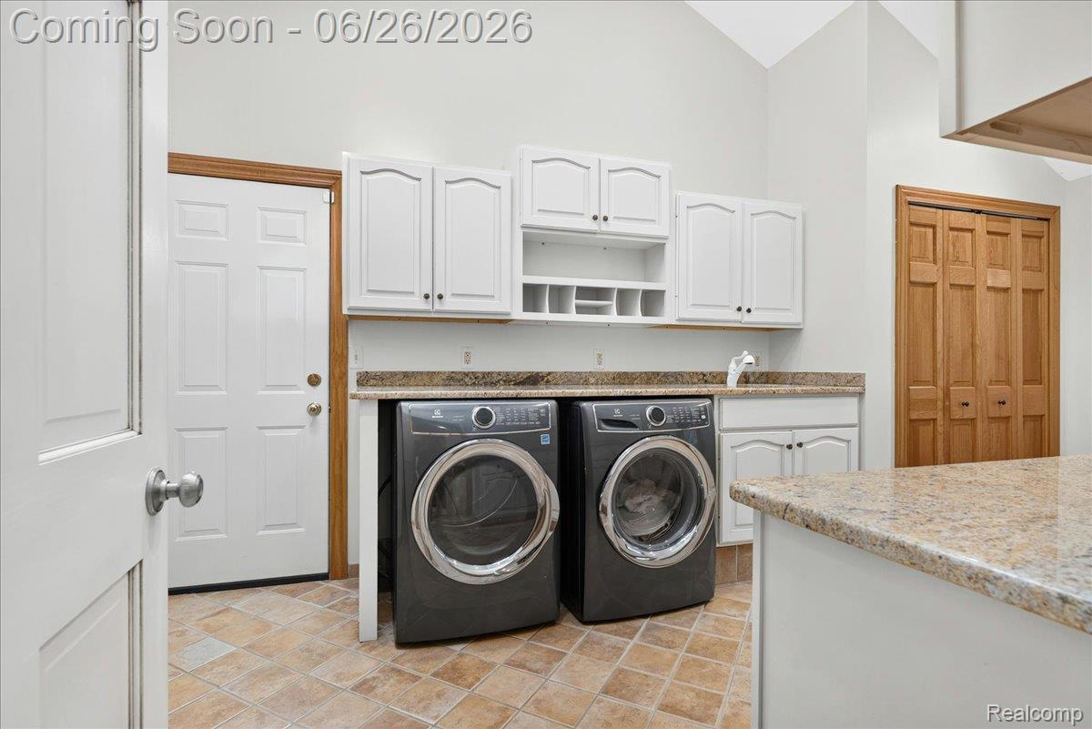 29498 East River Road Grosse Ile, MI 48138 - Photo 15 of 66 First Floor Laundry / Mud Room with Door to Garage and Side