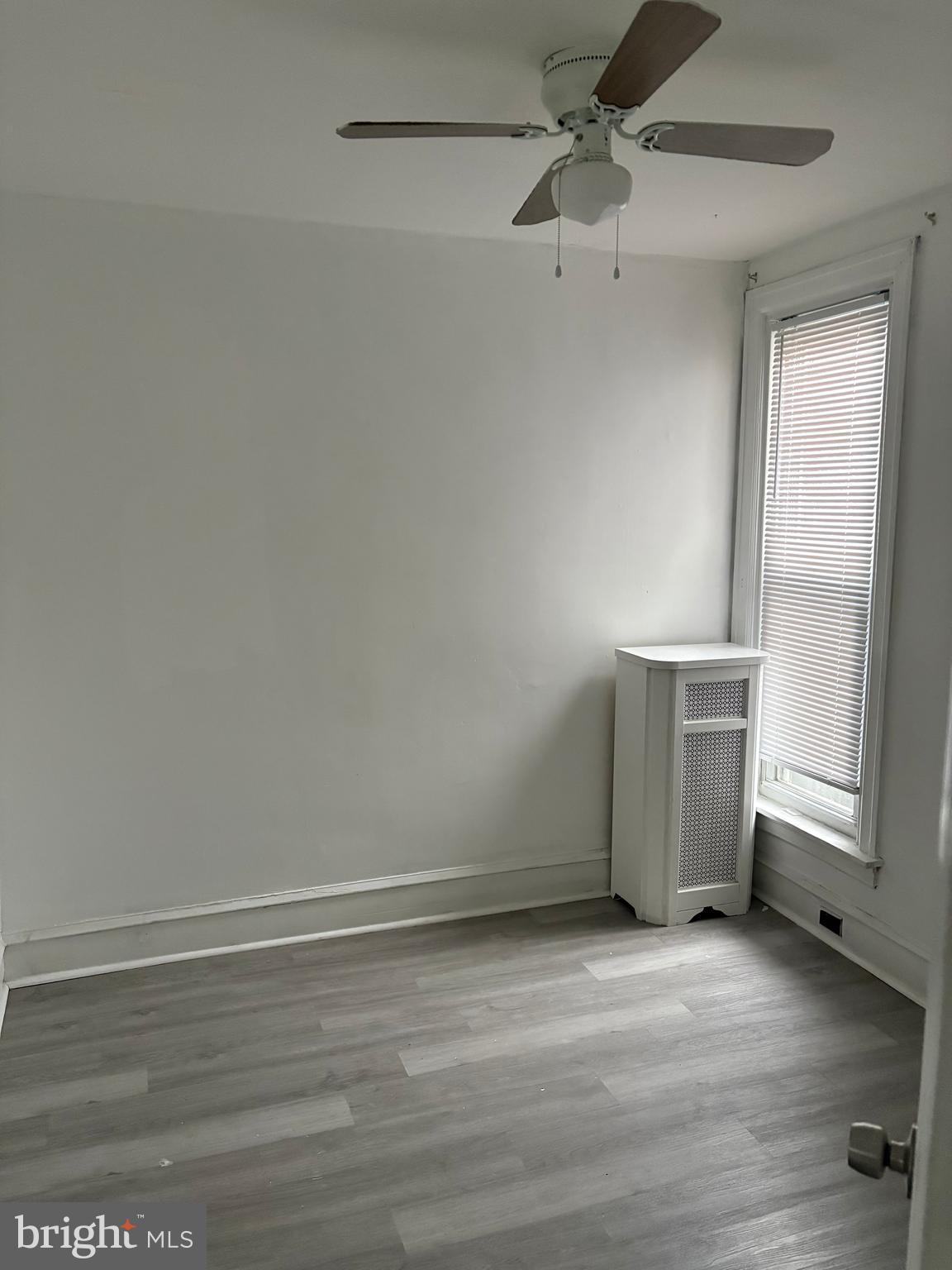 6380 Marsden Street Philadelphia, PA 19135 - Photo 8 of 9 a view of an empty room with a window