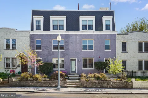 a front view of multi story residential apartment building