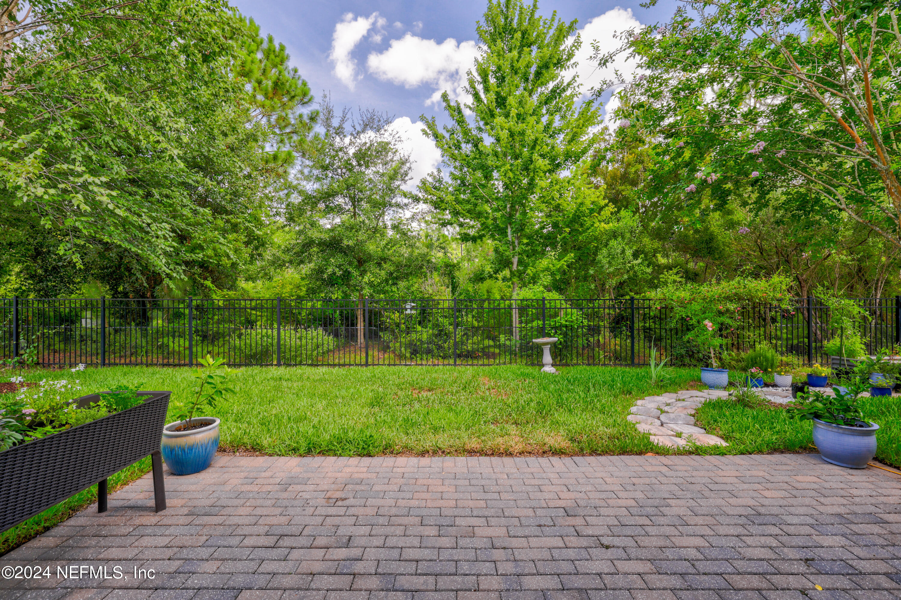 447 Glenneyre Circle St. Augustine, FL 32092 - Photo 30 of 44 a view of a park with plants and large trees