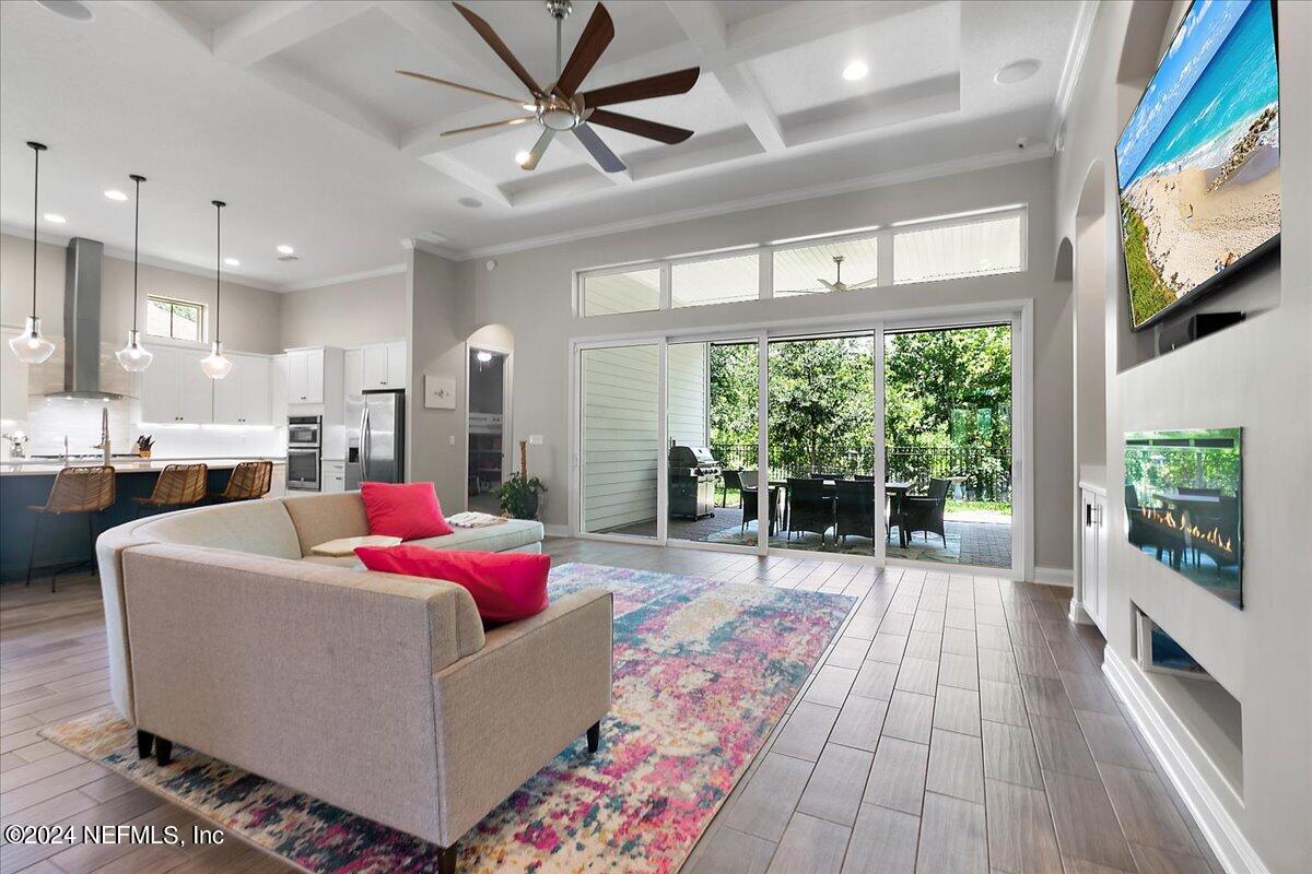 447 Glenneyre Circle St. Augustine, FL 32092 - Photo 7 of 44 a living room with furniture and a large window