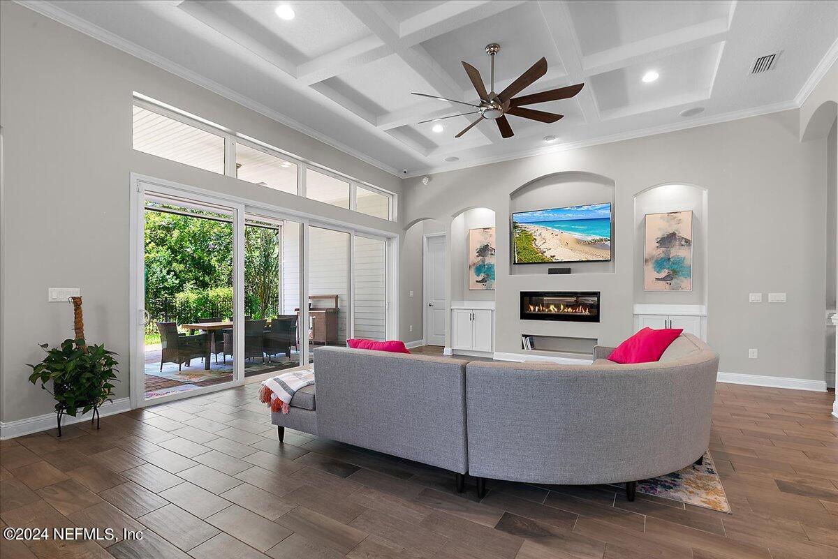 447 Glenneyre Circle St. Augustine, FL 32092 - Photo 8 of 44 a living room with furniture and a large window