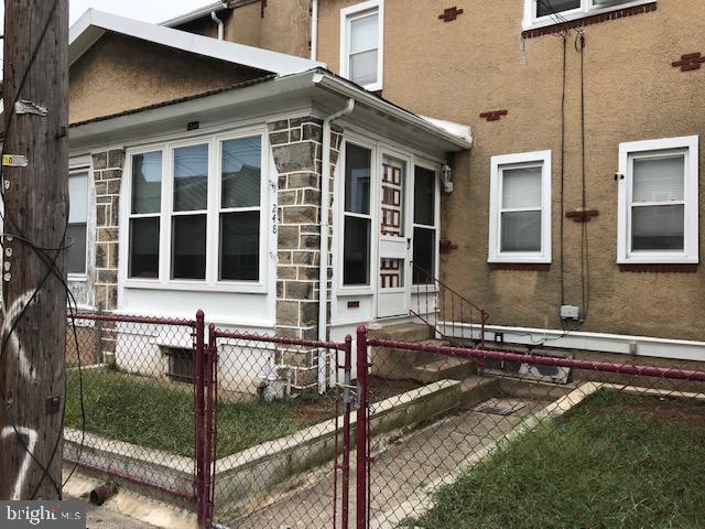 House Front Fenced yard