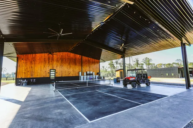 an outdoor sitting area with couch and table