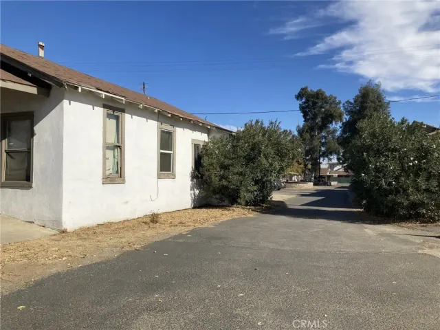 a view of a house with a street