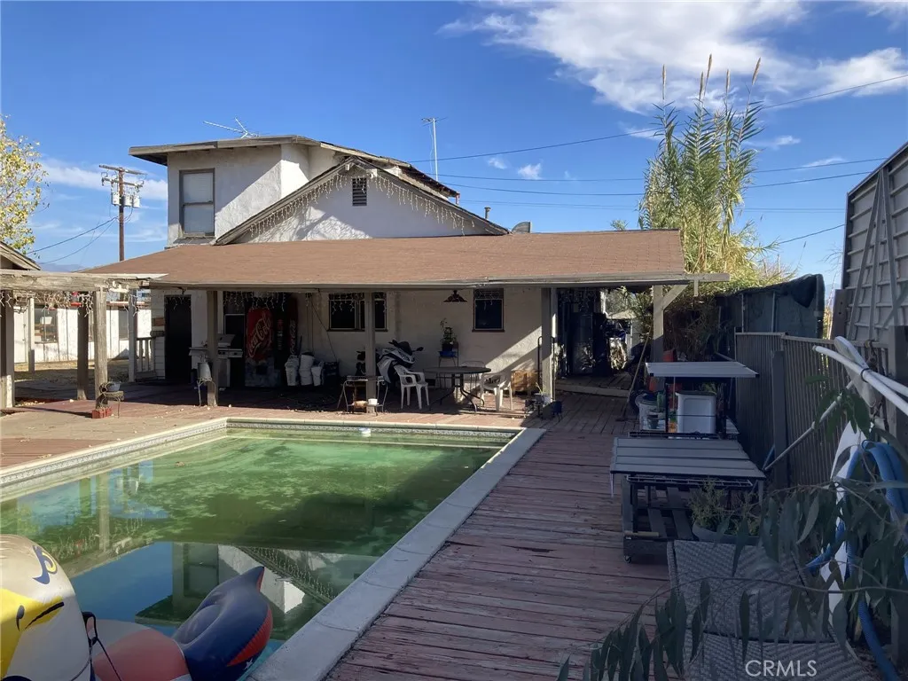 4439 Wade Avenue Perris, CA 92571 - Photo 3 of 11 a front view of a house with garden